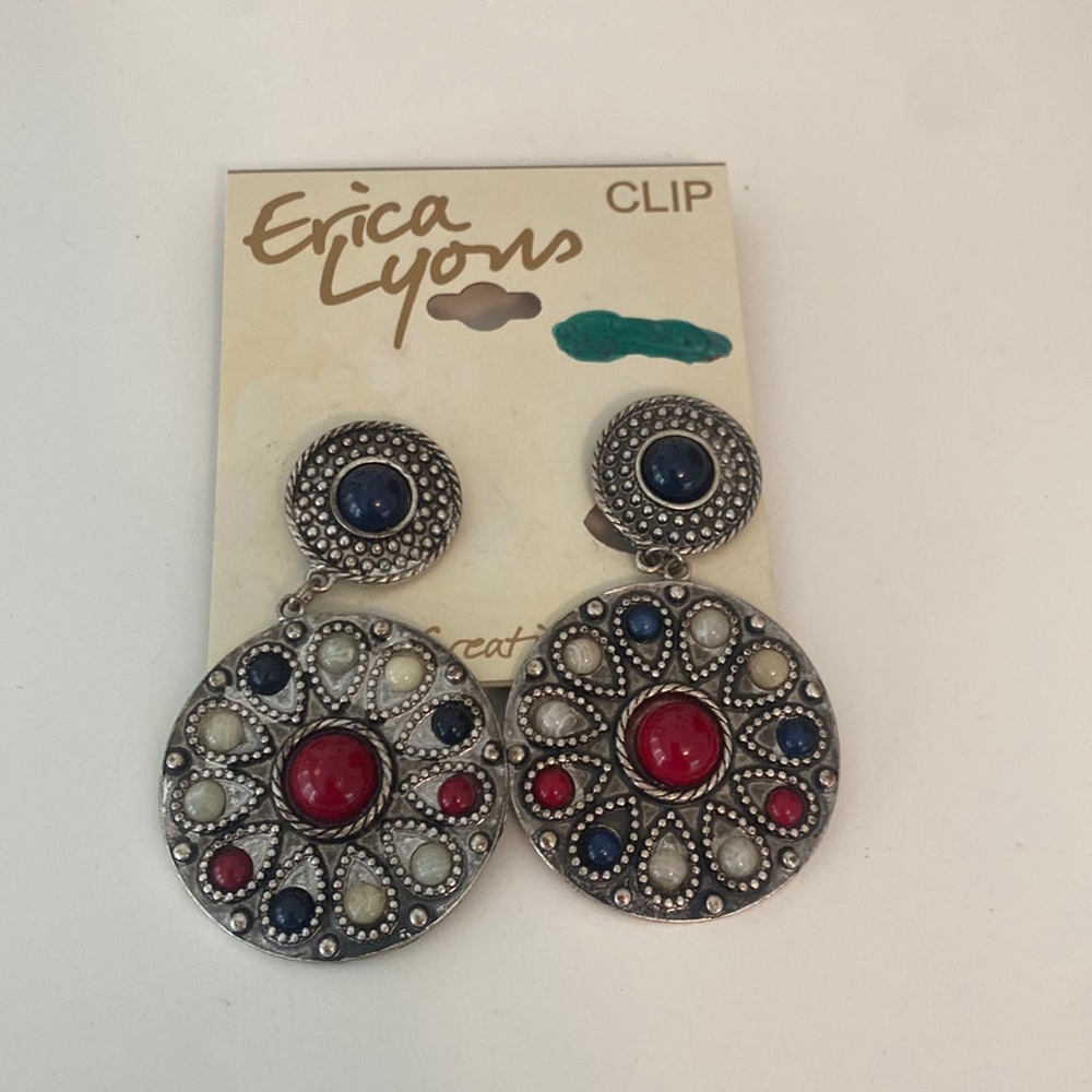 Clip on earrings with blue, red and white on them